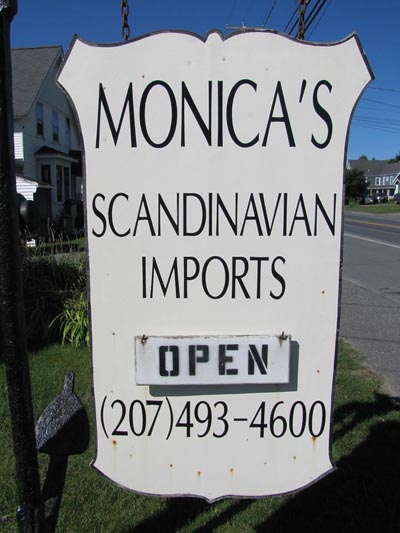 Monicas Imports Sign